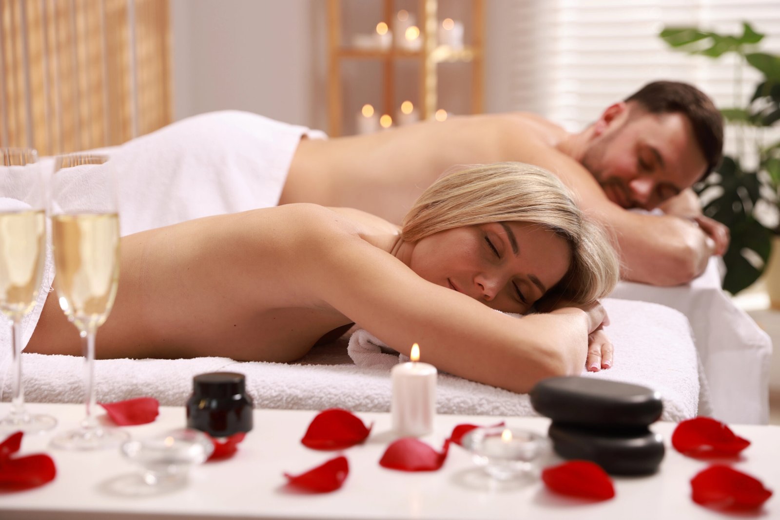 Couples enjoying a relaxing side-by-side massage with aromatherapy oils at Step Above Massage.